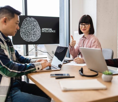 IT experts collaborating on artificial intelligence development