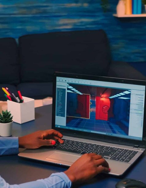 Young woman testing a computer game